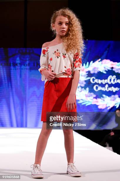 Models walk the runway for Camellia Couture at the House of iKons show during London Fashion Week February 2018 at Millenium Gloucester London Hotel...