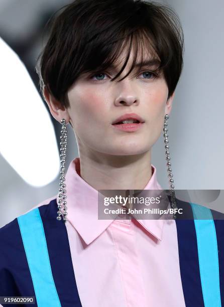 Model Lara Mullen walks the runway at the House of Holland show during London Fashion Week February 2018 at TopShop Show Space on February 17, 2018...