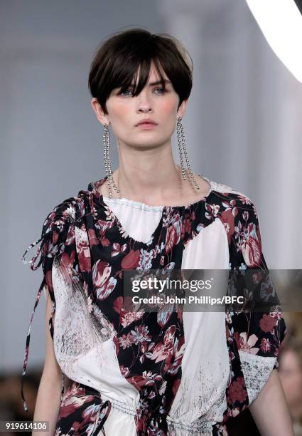 Model Lara Mullen walks the runway at the House of Holland show during London Fashion Week February 2018 at TopShop Show Space on February 17, 2018...