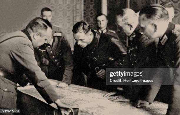 General Heinz Guderian and the Red Army commissar Borovensky during preliminary negotiations, 1939. Found in the Collection of Russian State Military...