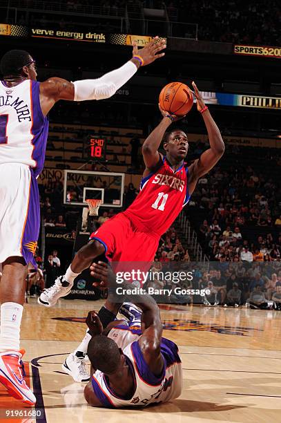 Jrue Holiday of the Philadelphia 76ers drives for a shot against the Phoenix Suns in an NBA Game played on October 16, 2009 at U.S. Airways Center in...