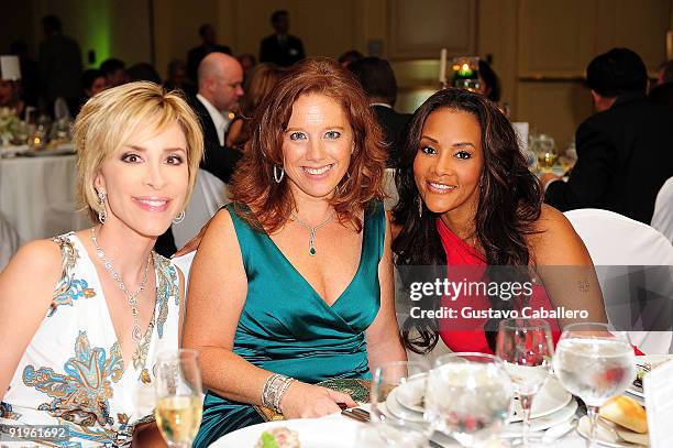 Lynn Martinez, Michelle Payer and Vivica Fox attends the First Annual Friends of the Orphans Gala at J.W. Marriott on October 16, 2009 in Miami,...