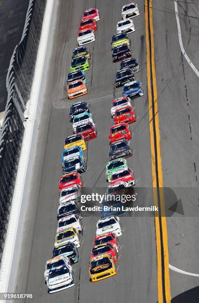 Daniel Hemric, driver of the South Point Hotel & Casino Chevrolet, and Kyle Larson, driver of the DC Solar Chevrolet, lead the field to start the...