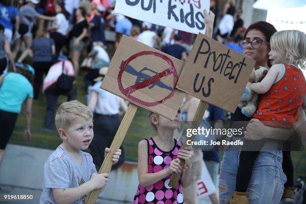 Reef Buehler joins his parents and others after a school shooting that killed 17 to protest against guns on the steps of the Broward County Federal...