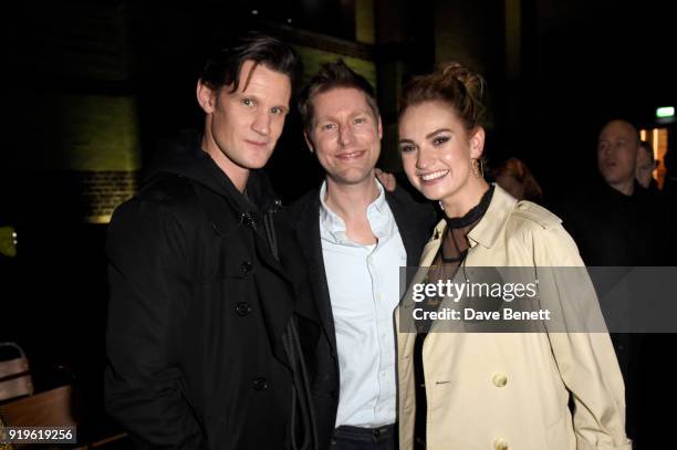 Designer Christopher Bailey, Matt Smith and Lily James seen at the Burberry February 2018 show during London Fashion Week at Dimco Buildings on...