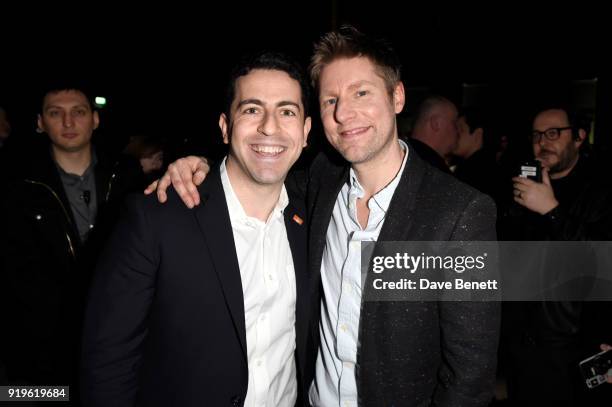 Designer Christopher Bailey and guest seen at the Burberry February 2018 show during London Fashion Week at Dimco Buildings on February 17, 2018 in...