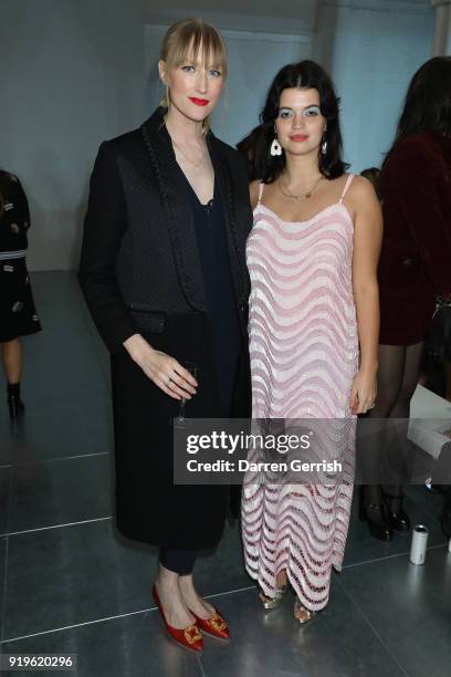 Jade Parfitt and Pixie Geldof attend the House of Holland show during London Fashion Week February 2018 at TopShop Show Space on February 17, 2018 in...