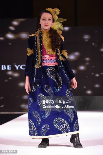 Models walk the runway for Be Unique Be You at the House of iKons show during London Fashion Week February 2018 at Millenium Gloucester London Hotel...
