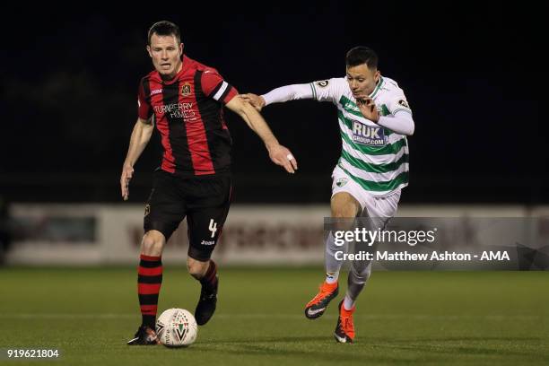 Andy Dowie of Dumbarton and Dean Ebbe of TNS during the Irn Bru Cup Semi-Final match between The New Saints and Dumbarton at Park Hall on February...