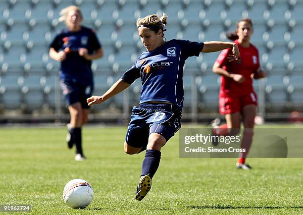 Katrina Gorry from Melbourne strikes the ball during the round three W-League match between Adelaide United and the Melbourne Victory at Hindmarsh...