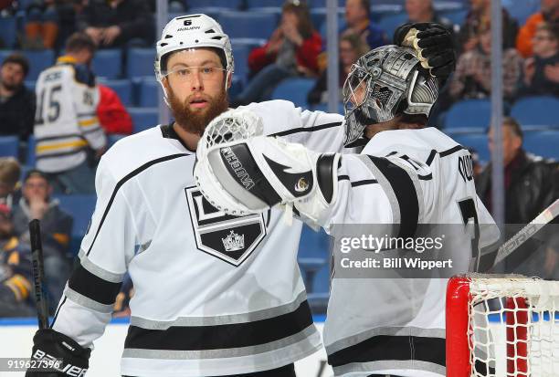Jake Muzzin and Jonathan Quick of the Los Angeles Kings celebrate after an NHL game against the Buffalo Sabres on February 17, 2018 at KeyBank Center...