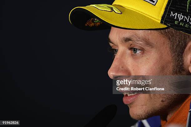 Valentino Rossi of Italy rider of the Fiat Yamaha Team Yamaha talks to the media after at a press conference after the qualifying session for the...