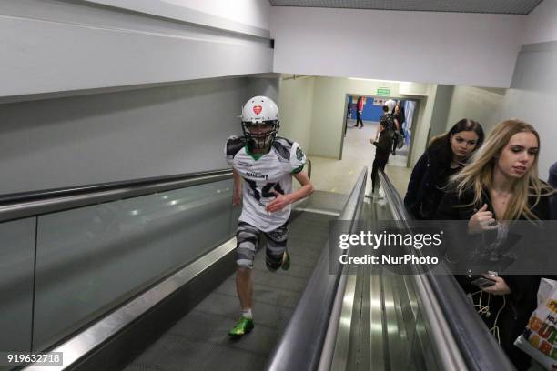 Runner running on escalator is seen in Gdansk, Poland on 17 February 2018 Runners take part in the Manhattan Run - run competition inside the...