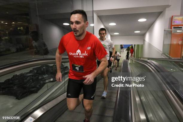 Runners running on escalator are seen in Gdansk, Poland on 17 February 2018 Runners take part in the Manhattan Run - run competition inside the...
