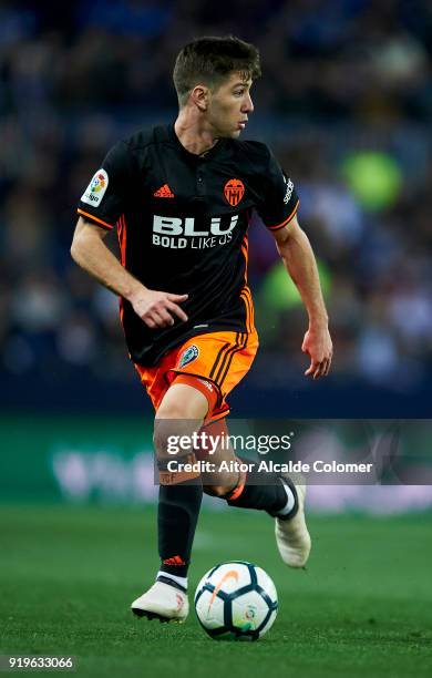 Luciano Vietto of Valencia controls the ball during the La Liga match between Malaga and Valencia at Estadio La Rosaleda on February 17, 2018 in...