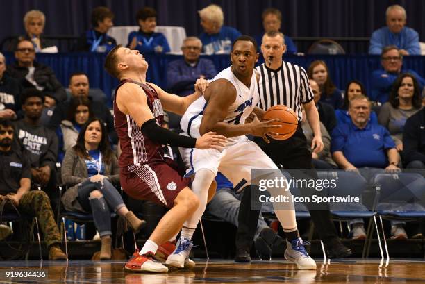 Indiana State Sycamores center Brandon Murphy backs into Southern Illinois Salukis forward Rudy Stradnieks during the Missouri Valley Conference...