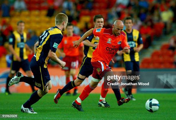 Danny Tiato of the Roar in attack during the round 11 A-League match between the Brisbane Roar and the Central Coast Mariners at Suncorp Stadium on...