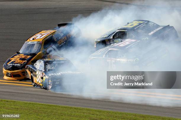 Daniel Hemric, driver of the South Point Hotel & Casino Chevrolet, Jeff Green, driver of the RSS Racing Chevrolet, Spencer Boyd, driver of the Grunt...