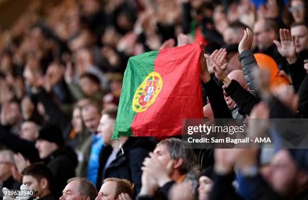 Fans of Wolverhampton Wanderers with a flag of Portugal during the Sky Bet Championship match between Preston North End and Wolverhampton at Deepdale...