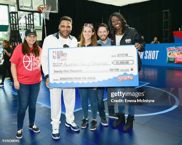 Actor Anthony Anderson challenges fans to the 'Around The Ridge' competition at Ruffles' 'The RIDGE' 4 point-line footprint in Los Angeles during NBA...