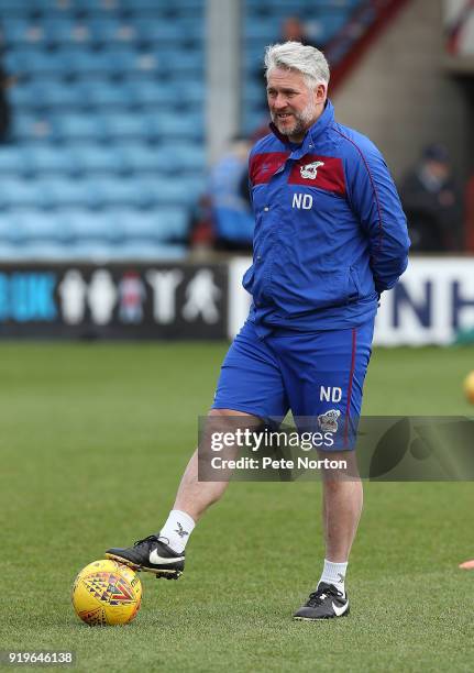 Scunthorpe United first team coach Nick Daws looks on prior to the Sky Bet League One match between Scunthorpe United and Northampton Town at...