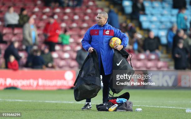 Scunthorpe United kit man Nathan Stanton looks on prior to the Sky Bet League One match between Scunthorpe United and Northampton Town at Glanford...
