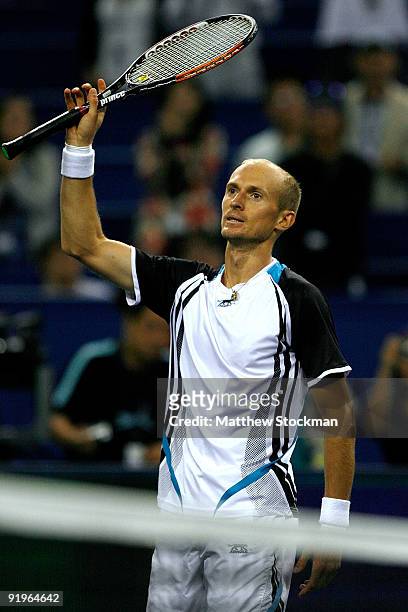Nikolay Davydenko of Russia acknowledges the crowd after defeating Novak Djokovic of Serbia during the semifinal round on day seven of the 2009...