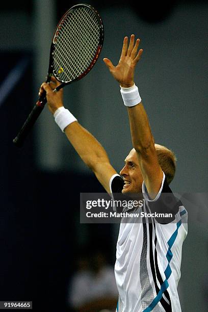Nikolay Davydenko of Russia celebrates match point against Novak Djokovic of Serbia during the semifinal round on day seven of the 2009 Shanghai ATP...