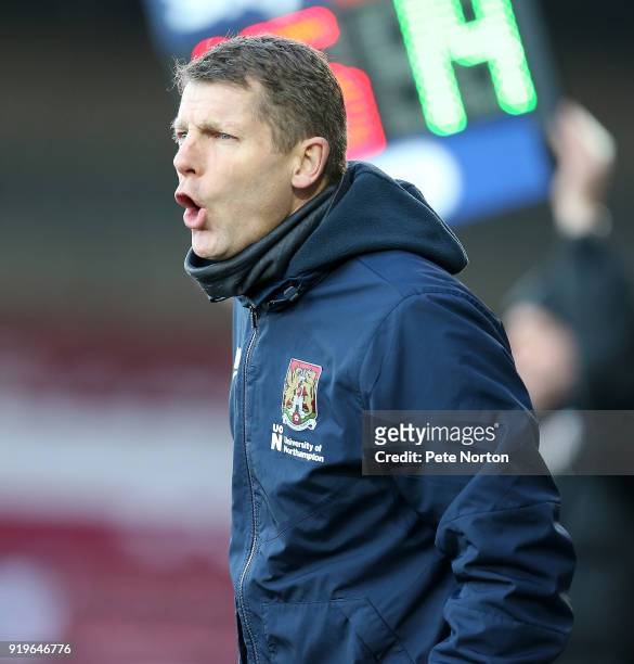 Northampton Town assistant manager Dean Austin gives instructions during the Sky Bet League One match between Scunthorpe United and Northampton Town...