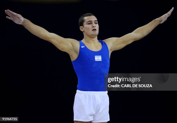 Israel's Alexander Shatilov performs in the men's floor event in the appatus finals during the Artistic Gymnastics World Championships 2009 at the 02...