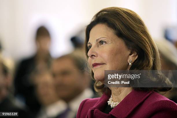 Queen Silvia of Sweden listens to a speech during the opening of the first german section in a hospital for dementia patients following the model of...