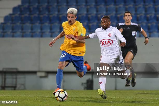 Estoril Praia defender Fernando Fonseca from Portugal with CF Os Belenenses forward Fredy from Angola in action during the Primeira Liga match...