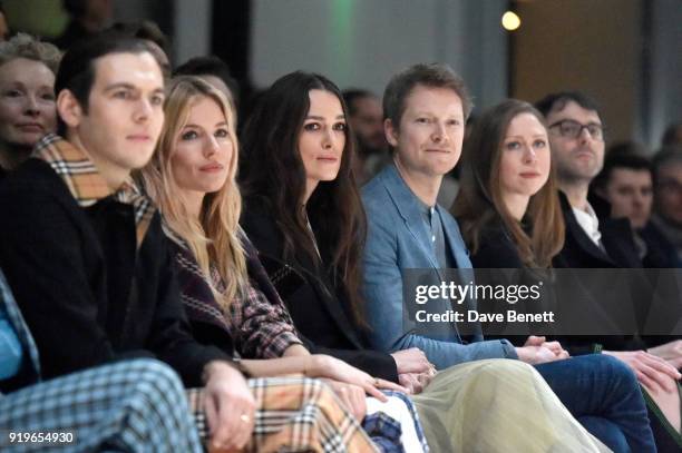 James Righton, Sienna Miller, Keira Knightley, Simon Woods, Chelsea Clinton and Marc Mezvinsky wearing Burberry at the Burberry February 2018 show...
