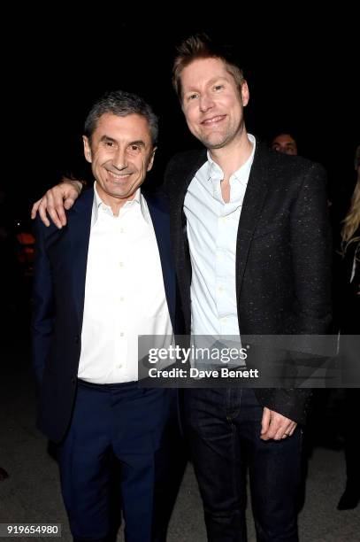 Designer Christopher Bailey and Burberry CEO Marco Gobbetti seen at the Burberry February 2018 show during London Fashion Week at Dimco Buildings on...