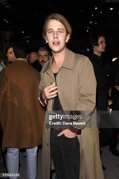 Tom Odell wearing Burberry at the Burberry February 2018 show during London Fashion Week at Dimco Buildings on February 17, 2018 in London, England.