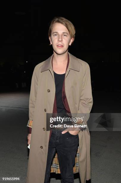 Musician Tom Odell wearing Burberry at the Burberry February 2018 show during London Fashion Week at Dimco Buildings on February 17, 2018 in London,...