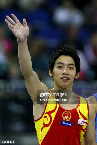 Kai Zou of China poses after he came third in the floor exercise event during the Apparatus Finals on the fifth day of the Artistic Gymnastics World...