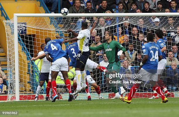 Ledley King of Tottenham Hotspur scores the opening goal of the match during the Barclays Premier League match between Portsmouth and Tottenham...