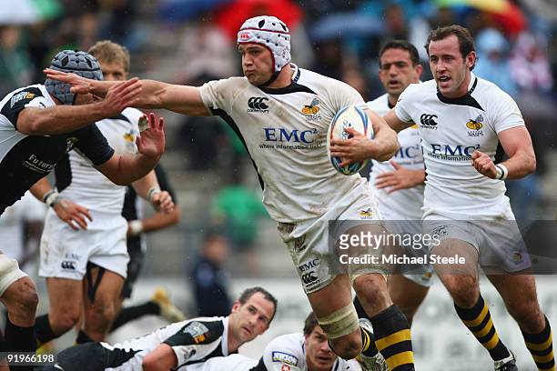Dan Ward-Smith of Wasps runs at the Roma defence during the Amlin Challenge Cup Pool Four match between Rugby Roma and London Wasps at the Stadio Tre...