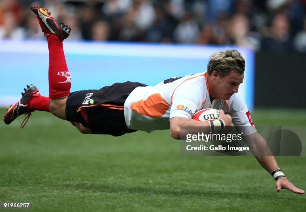 Jacques-Louis Potgieter scores his try for the Cheetahs during the Absa Currie Cup semi final match between the Sharks and Cheetahs from Absa Park on...