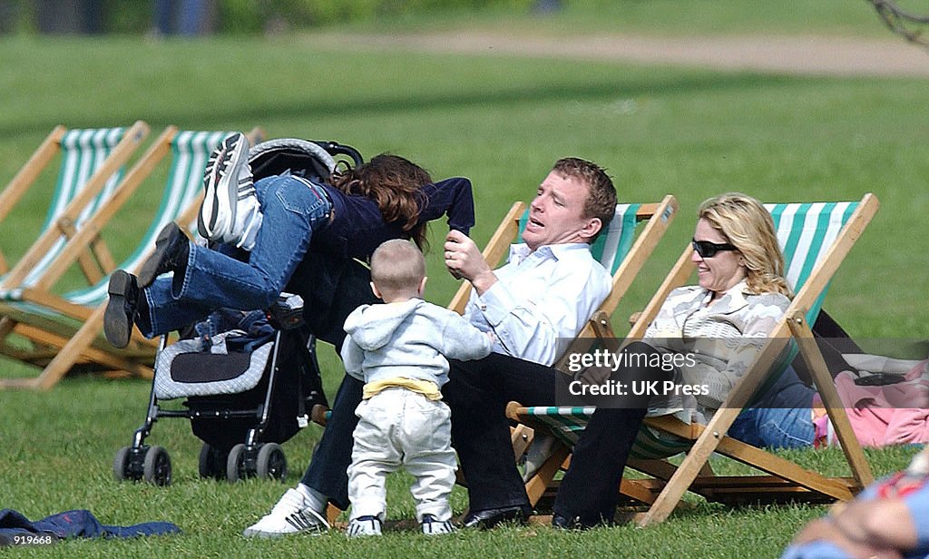 (File Photo) Madonna and Family Walk In The Park