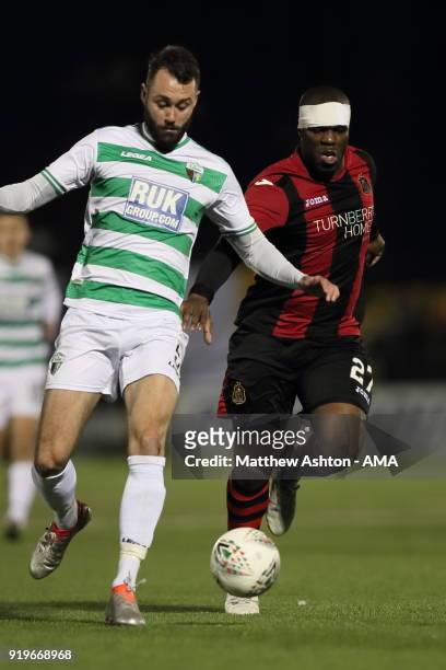 Connell Rawlinson of TNS and Christian Nade of Dumbarton during to the Irn Bru Cup Semi-Final match between The New Saints and Dumbarton at Park Hall...