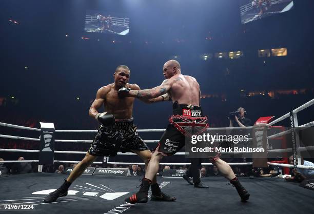 George Groves of England and Chris Eubank JR of England exchange blows during their WBSS Super Middleweight bout at the Manchester Arena on February...