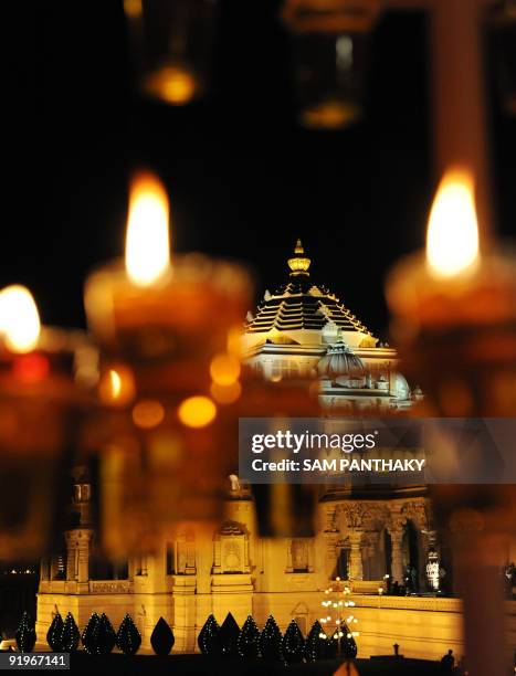 The illuminated Akshardham Temple is seen during Diwali in Gandhinagar, some 30 kms from Ahmedabad, on the occasion of Diwali on October 17, 2009....