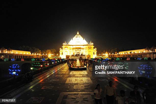 The illuminated Akshardham Temple is seen during Diwali in Gandhinagar, some 30 kms from Ahmedabad, on the occasion of Diwali on October 17, 2009....