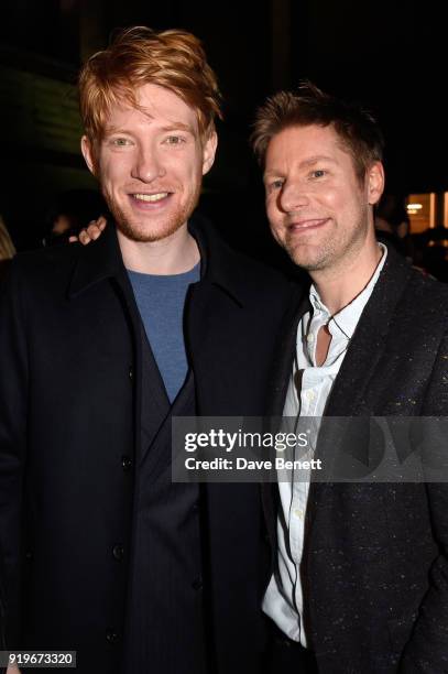 Designer Christopher Bailey and Domhnall Gleeson are seen following the Burberry February 2018 show during London Fashion Week at Dimco Buildings on...