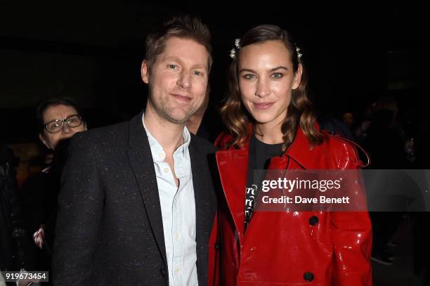 Designer Christopher Bailey and Alexa Chung are seen following the Burberry February 2018 show during London Fashion Week at Dimco Buildings on...