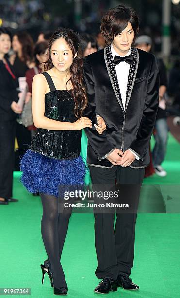 Japanese actress Mao Inoue and actor Masaki Okada walk on the green carpet during the 22nd Tokyo International Film Festival Opening Ceremony at...