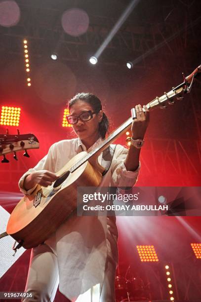 This picture taken on February 17, 2018 shows Endah Widiastuti and Rhesa Aditya, known as Endah N Rhesa, performing in Jakarta. / AFP PHOTO / Oeday...