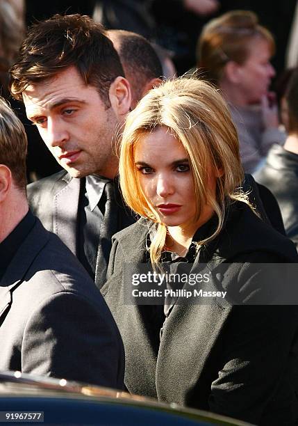 Westlife's Mark Feehily and Jodi Albert attends the funeral of Boyzone member Stephen Gately on October 17, 2009 in Dublin, Ireland.